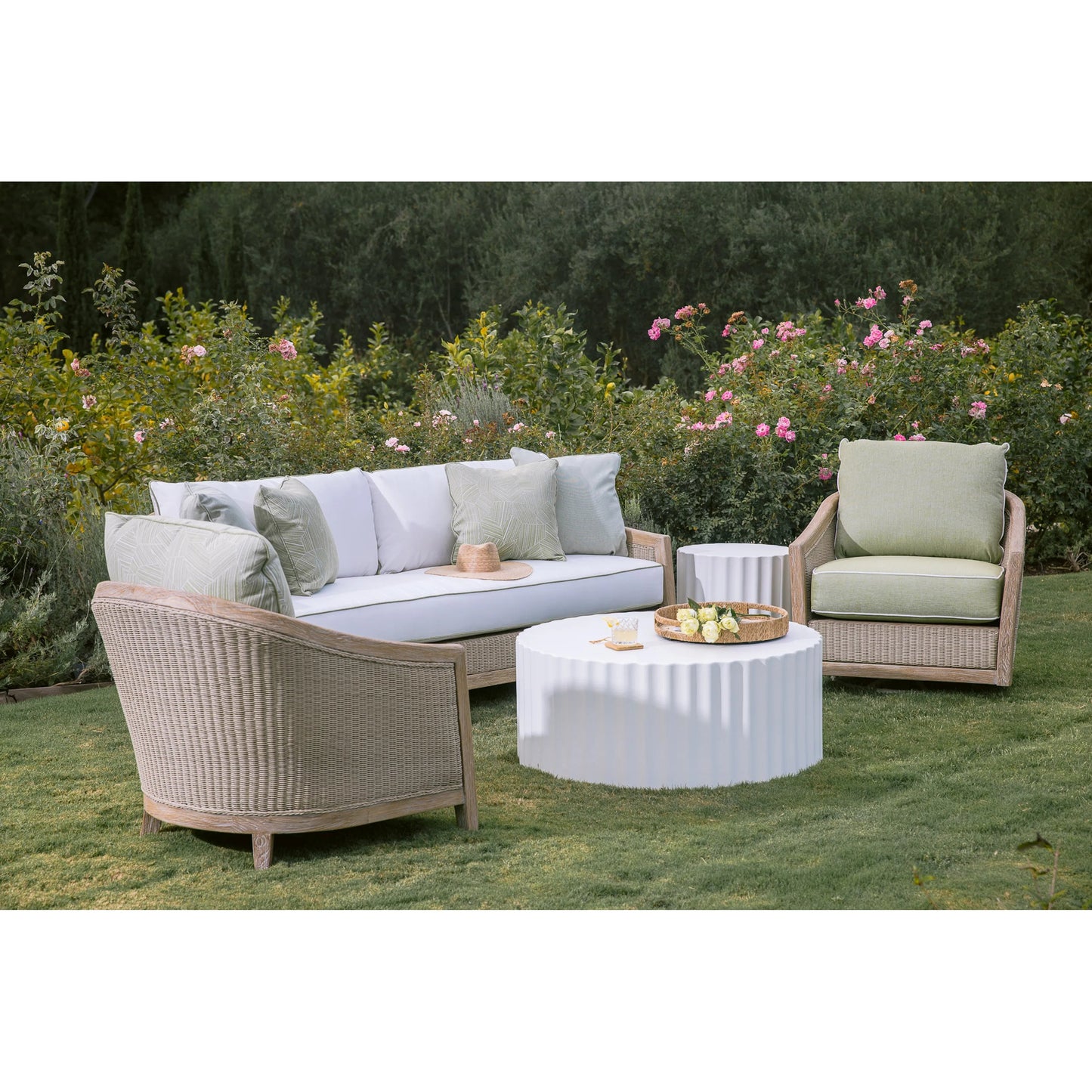 006 SI-2318670 | Lifestyle | Cambria Outdoor Sofa by Sunset West in light wood. Made from teak in a rustic style.