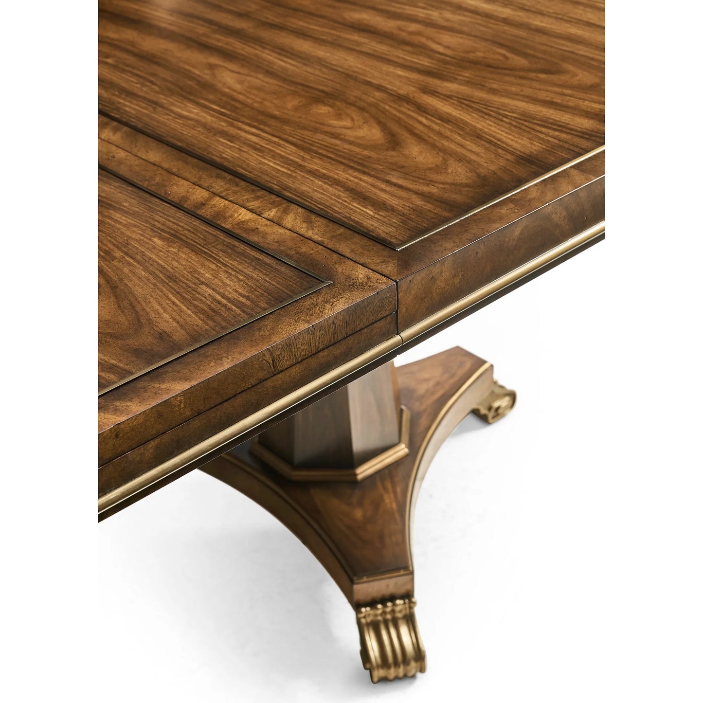 007 SI-2446832 | Closeup | Viceroy Rectangular Dining Table by Jonathan Charles in viceroy brown santos. Made from local mahogany, brass, santos rosewood crown veneer in a traditional style.