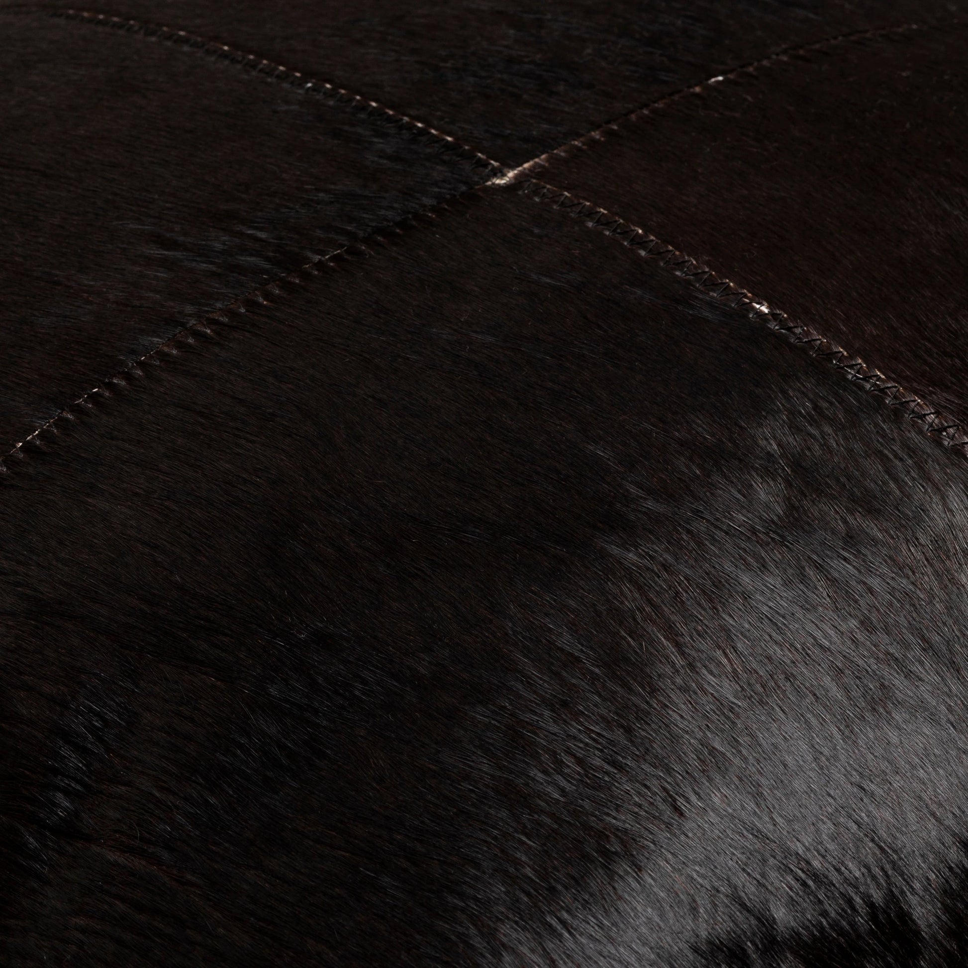 Dexter - 23384 by Livabliss in black. Made from 100% hair on hide, 100% cotton in a unique style.