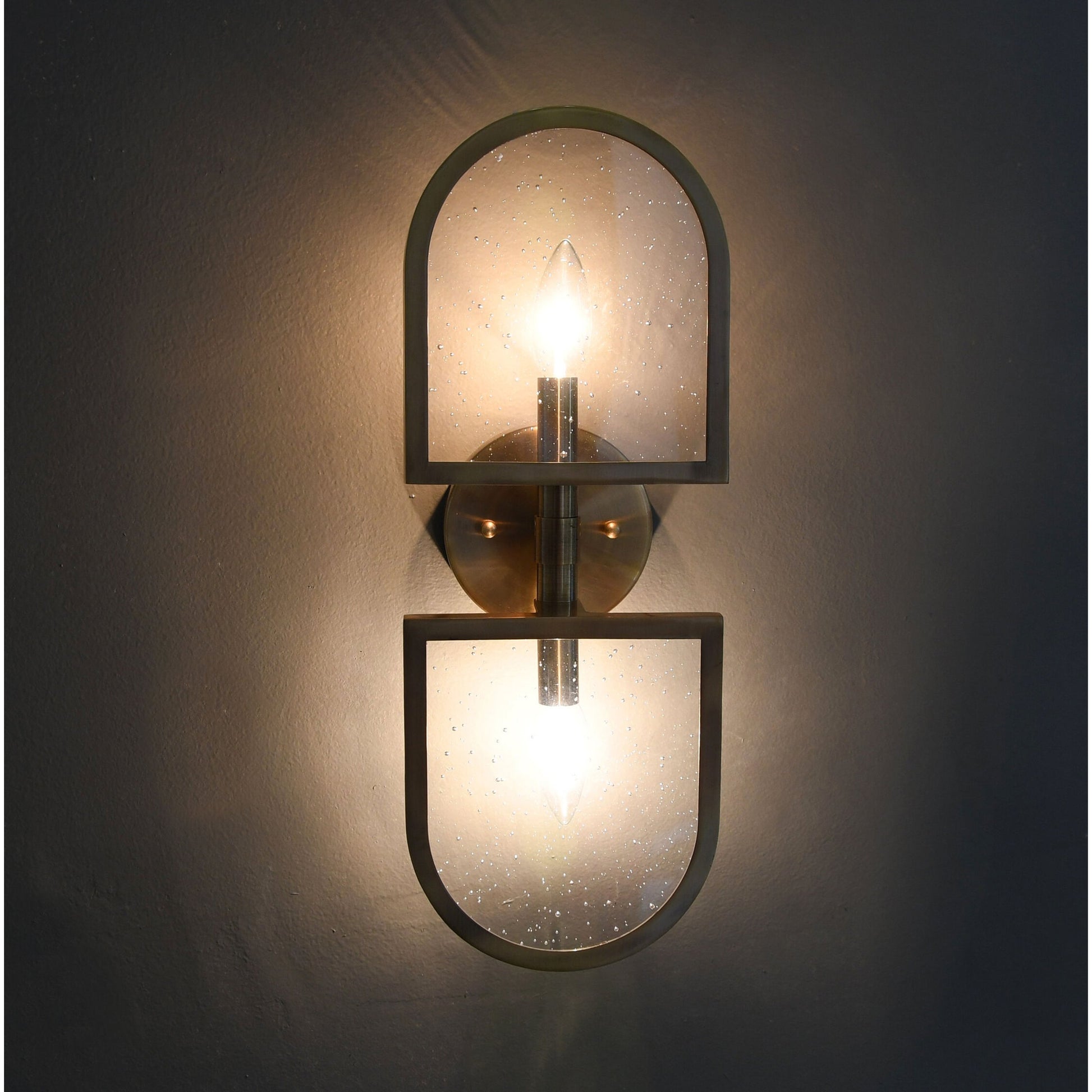 Dexter Sconce by Worlds Away in black. Made from metal, glass in a transitional style.