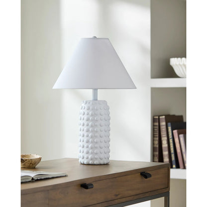 Diffa Accent Table Lamp by Livabliss. Made from resin, linen, plastic in a transitional style.