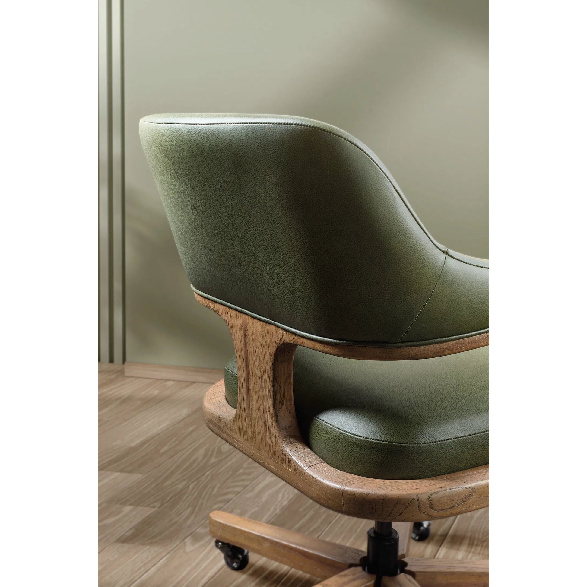 Briar Executive Swivel Tilt Chair by Hooker Furniture in verona forest and light transparent. Made from leather in a unique style.
