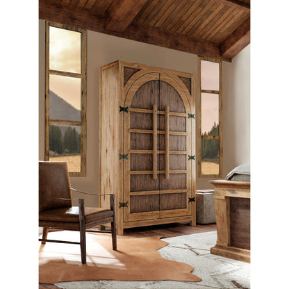 Big Sky Wardrobe by Hooker Furniture in vintage natural. Made from pecky hickory veneers, nailheads, solid-wood edged top in a modern style.