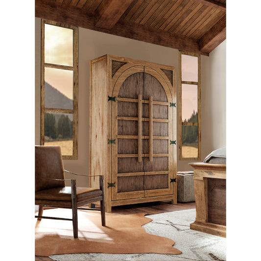 Big Sky Wardrobe by Hooker Furniture in vintage natural. Made from pecky hickory veneers, nailheads, solid-wood edged top in a modern style.