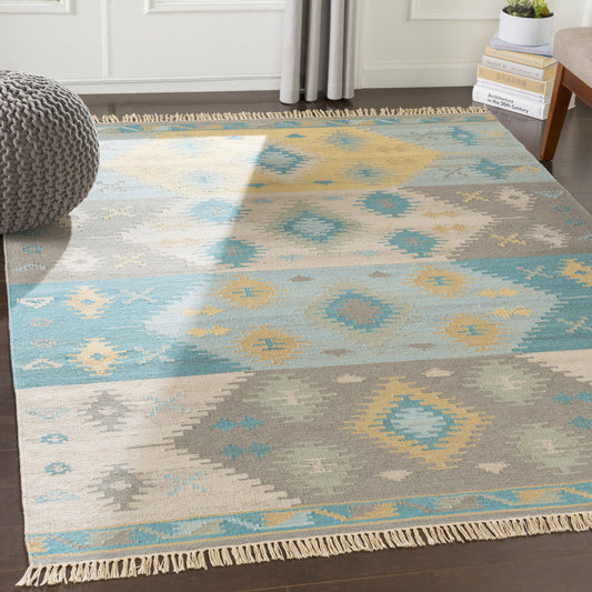 Adia Rug - 22965 by Surya in pale blue, beige, dusty sage, blue, tan, medium brown. Made from 100% wool in a unique style.