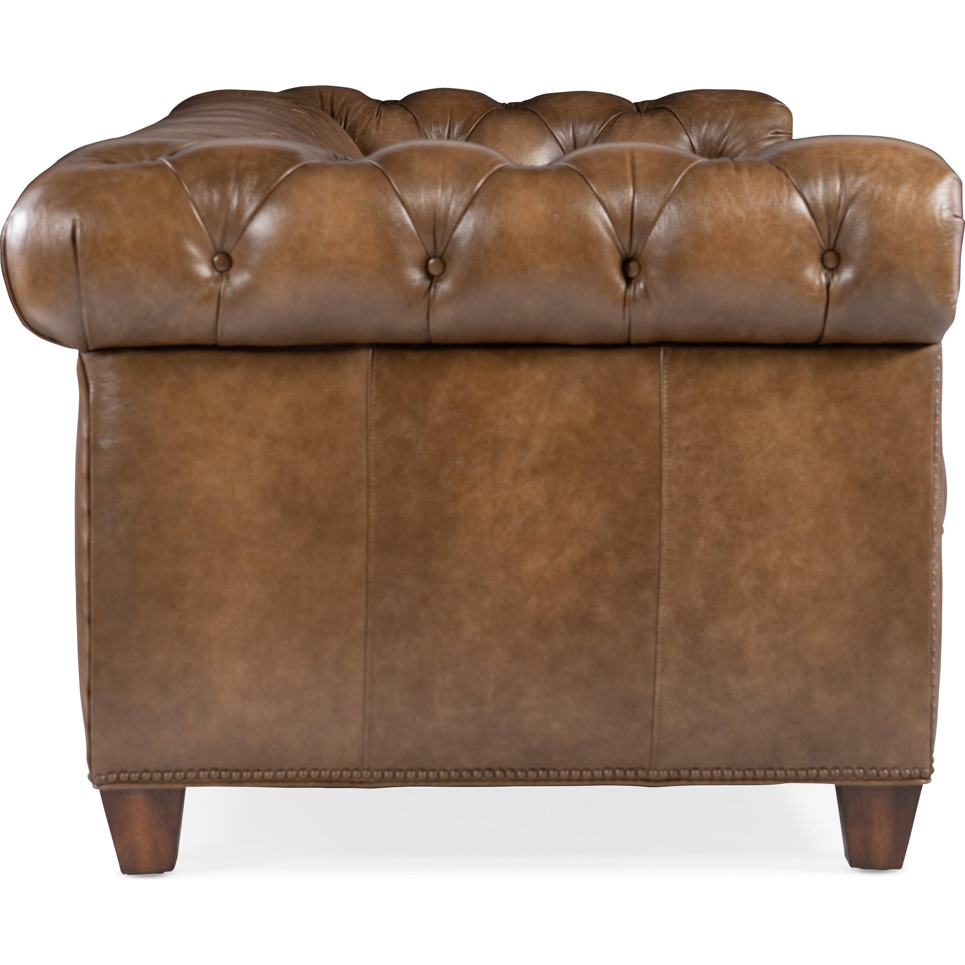 Chester Stationary Sofa by Hooker Furniture in brown. Made from leather in a rustic style.
