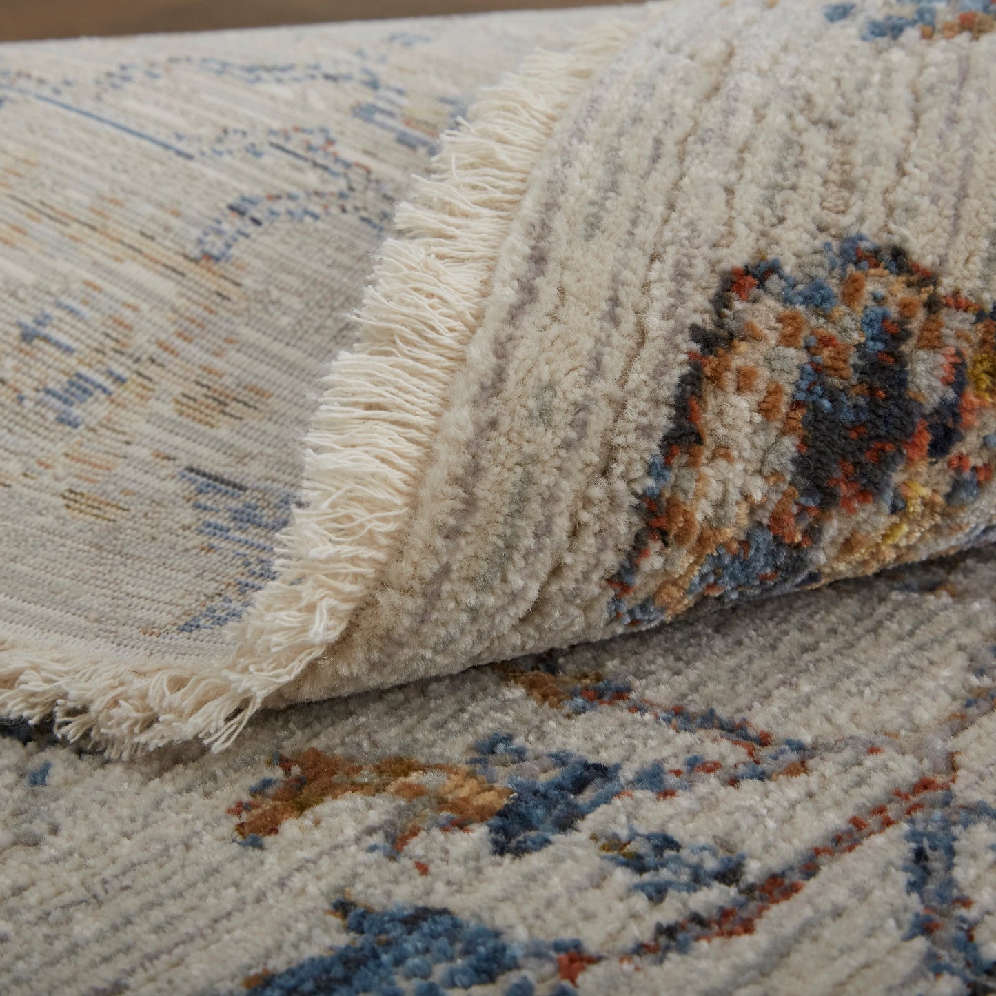 019 SI-2006824 | Closeup | Kaia Transitional & Botanical Rug - 39GPF by Feizy in ivory, orange, blue. Made from unique in a unique style.