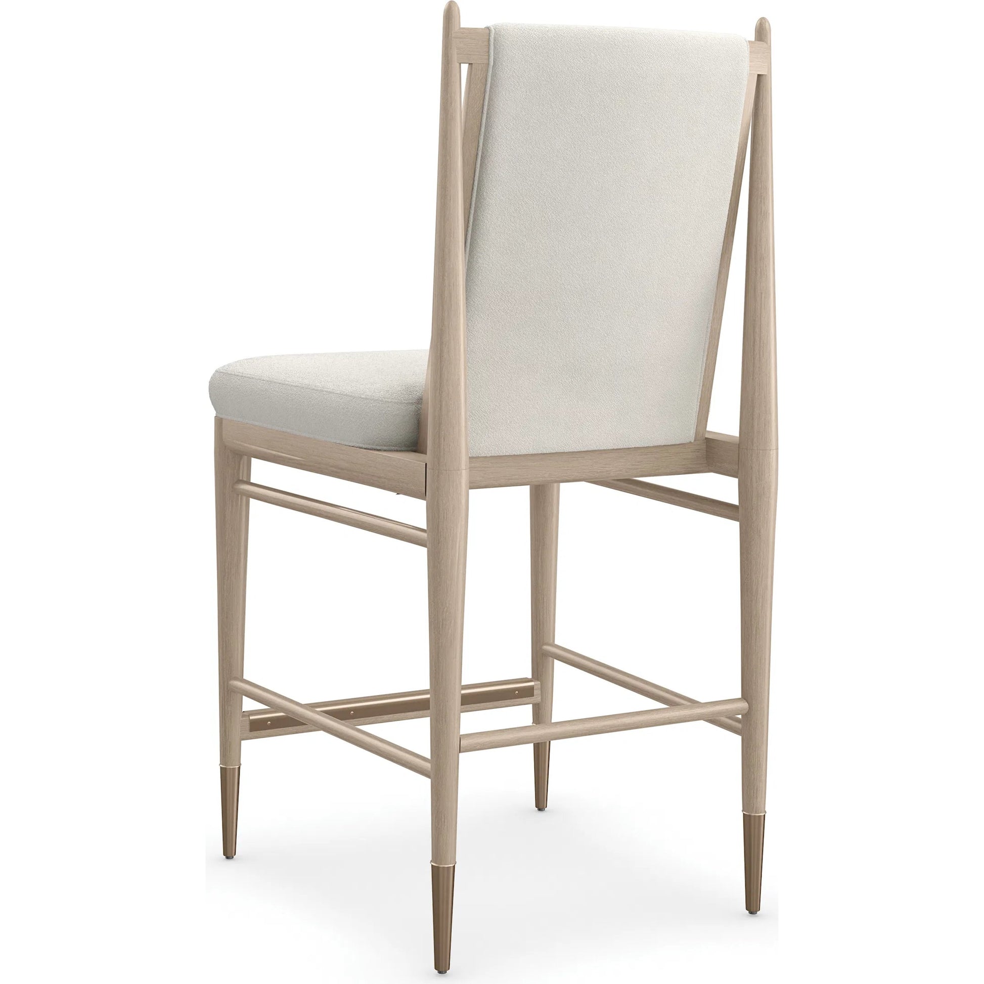 Unity Light Counter Stool by Caracole. Made from oak in a unique style.