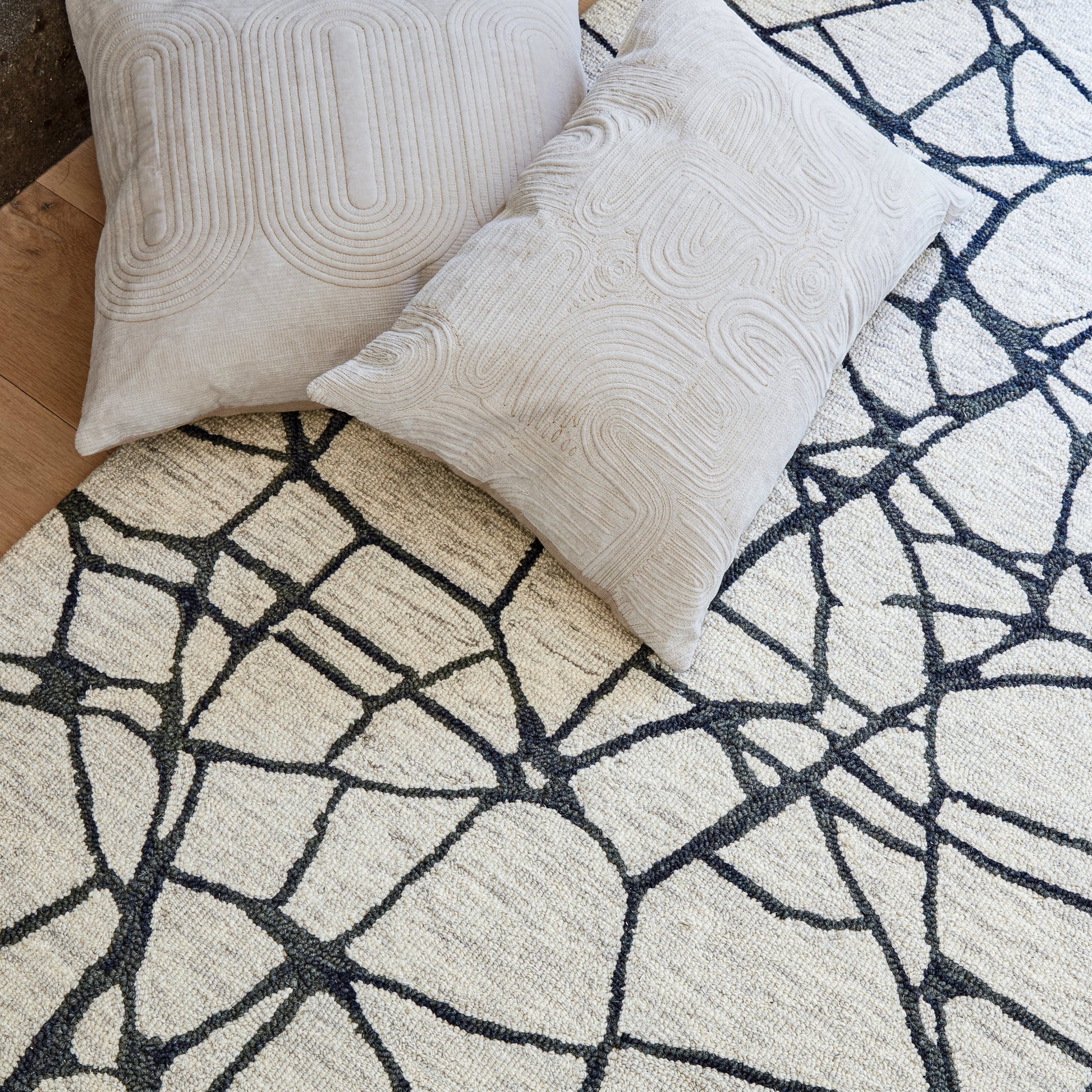 Deco by Nikki Chu DOC01 Pillow by Jaipur Living in ivory, gold. Made from 100% cotton in a modern style.