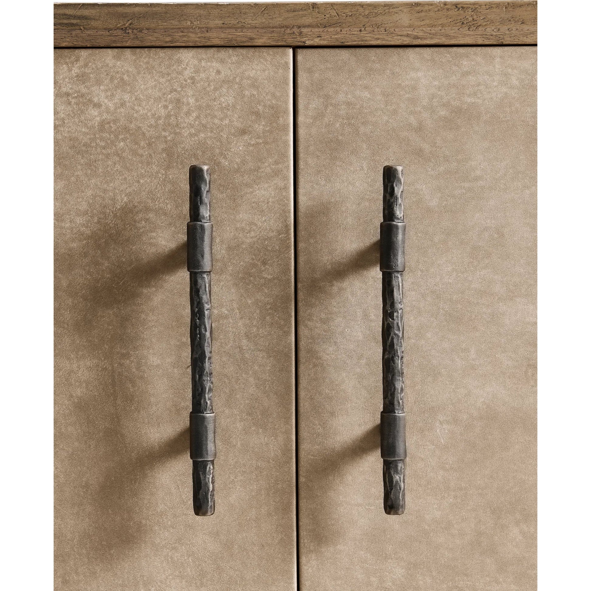 Stone Ridge Leather Credenza by Jonathan Charles in tully light acacia. Made from acacia in a transitional style.