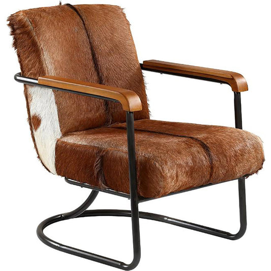 Avery Cow Hide Occasional Chair by Arch & Plane in brown, black and antique black frame with brown hide upholstery finish. Made from iron, cow hide upholstery in a modern style.