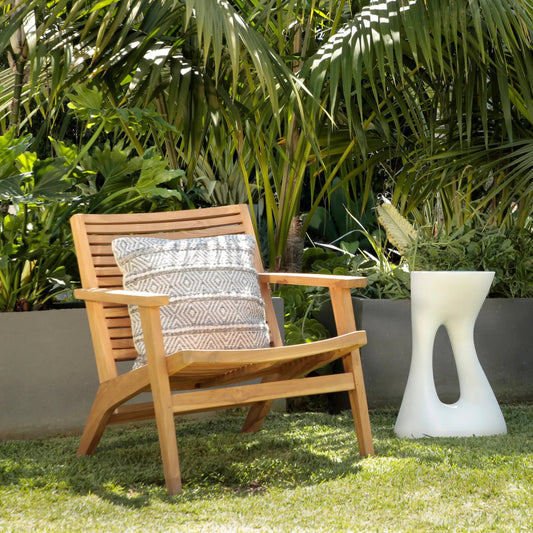 Janine Occasional Chair by Arch & Plane in natural finish. Made from teak wood in a unique style.