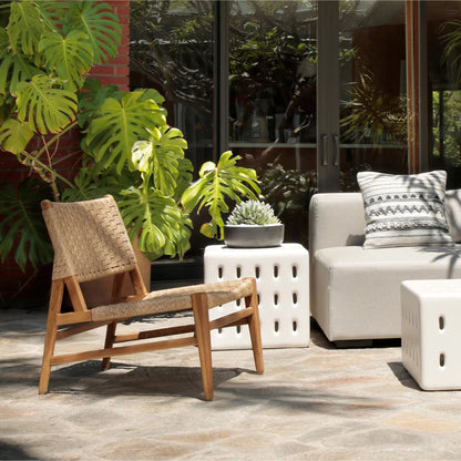 Mable Occasional Chair by Arch & Plane in natural. Made from teak wood, synthetic rattan in a rustic style.