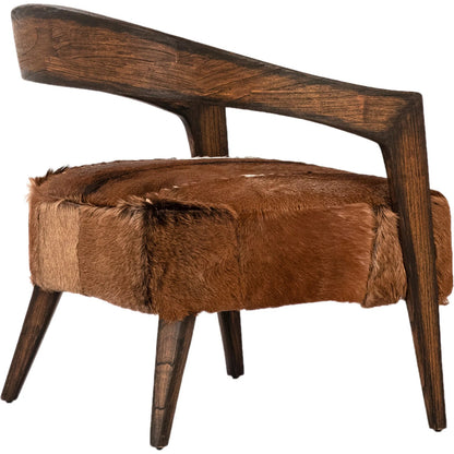 Michell Occasional Chair by Arch & Plane in natural brown finish. Made from goat hide, mindi wood in a cottage & farmhouse style.