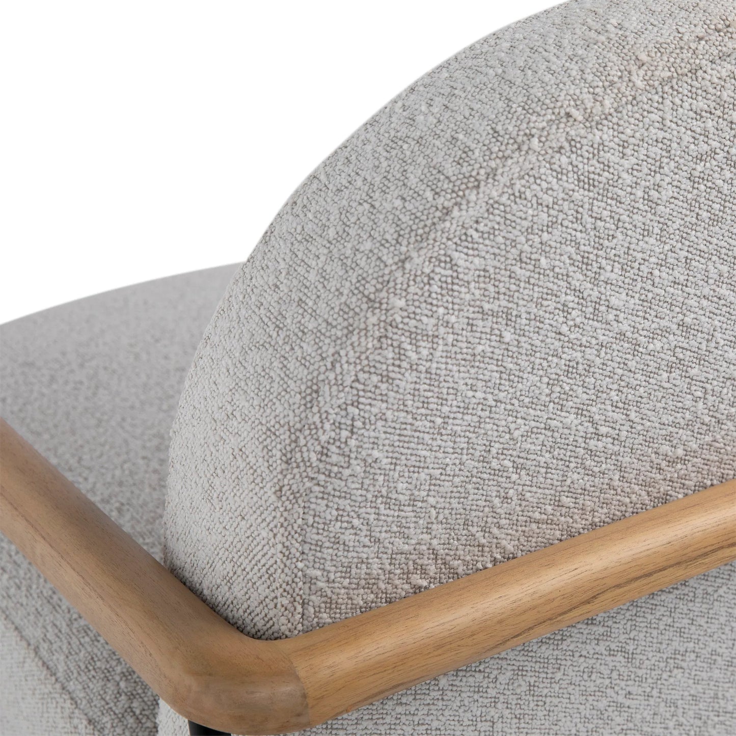 006 SI-2350529 | Closeup | Blake Occasional Chair by Arch & Plane in black metal frame with natural wood armrests, beige boucle fabric. Made from mindi wood, metal frame with polyester blend upholstery in a transitional style.