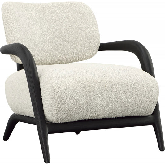 Arcona Occasional Chair by Arch & Plane in black wood, ivory boucle upholstery. Made from mindi wood frame, boucle upholstery in a unique style.