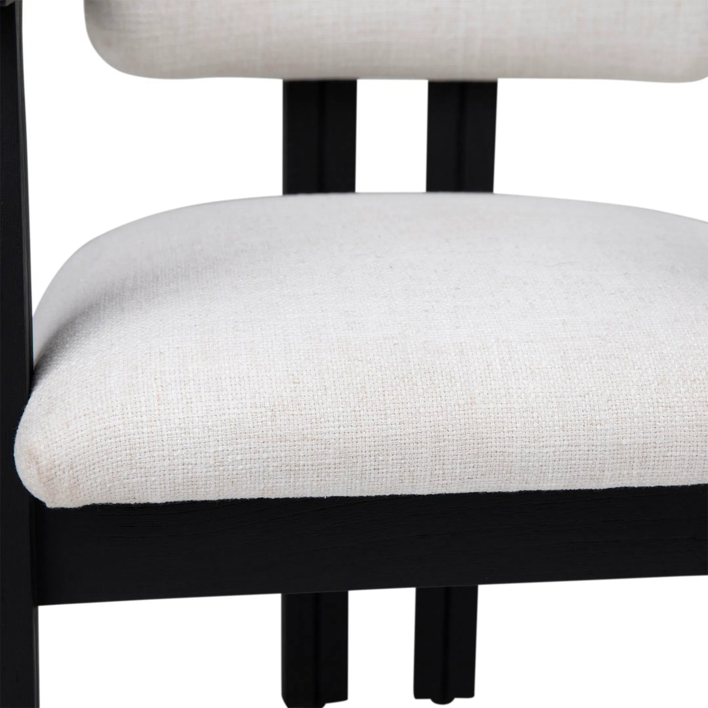 006 SI-2350536 | Closeup | Cali Dining Chair by Arch & Plane in off white, black frame. Made from polyester blend upholstery, mindi wood in a transitional style.