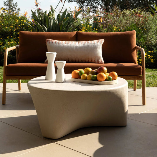 Lucius Outdoor Coffee Table by Arch & Plane in ivory. Made from lightweight concrete in a unique style.