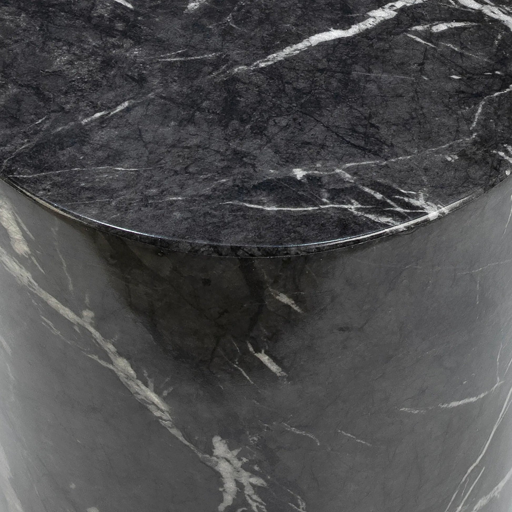 Sully Concrete Side Table by Arch & Plane in black and black marble water-transfer with white veining. Made from lightweight concrete in a modern style.