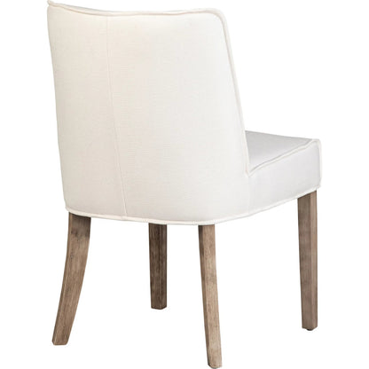 Rosia Dining Chair by Arch & Plane in off white upholstery, grey washed wood finish. Made from linen blend upholstery, rubber wood legs in a transitional style.