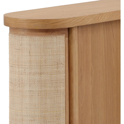 Joni Sideboard by Arch & Plane in natural. Made from rubber wood, oak veneer, cane in a transitional style.