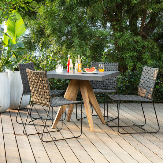 Leonard Outdoor Flat Rope Dining Chair by Arch & Plane in black and woven. Made from iron in a modern style.