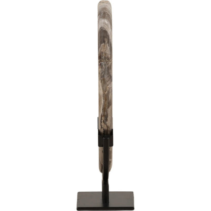 Taya Sculpture by Arch & Plane in black. Made from petrified wood, iron in a unique style.
