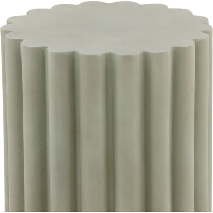 Aleen Outdoor Side Table by Arch & Plane in pastel green. Made from lightweight concrete in a unique style.