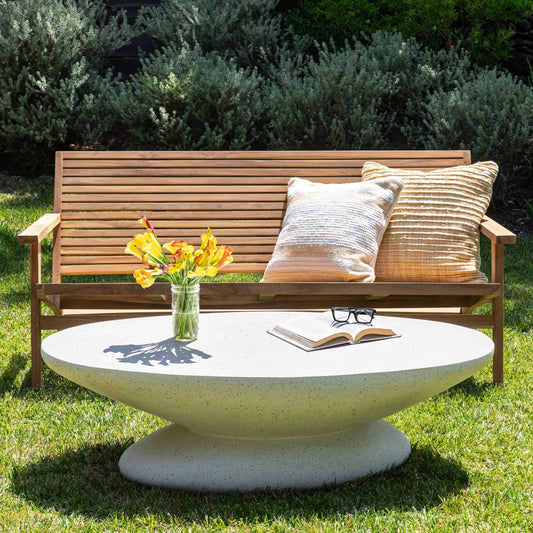 Jaela Coffee Table by Arch & Plane in ivory. Made from lightweight concrete terrazzo in a unique style.
