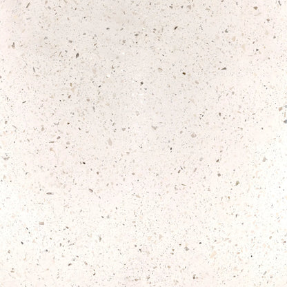 Quincy Outdoor Dining Table by Arch & Plane in ivory. Made from lightweight concrete terrazzo in a unique style.