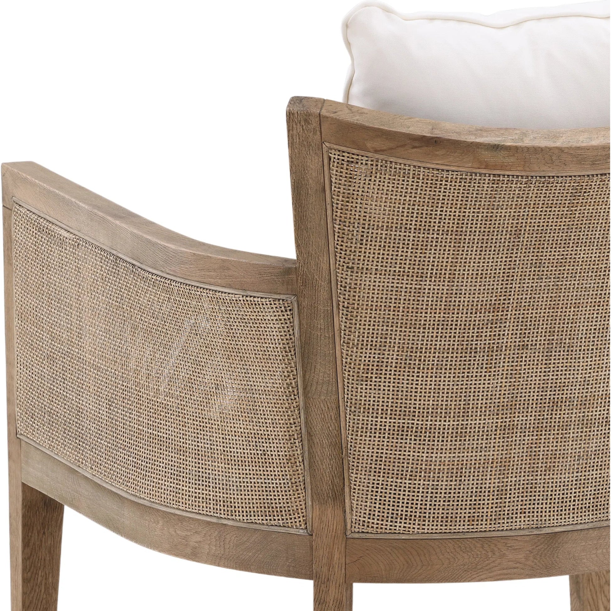 Leroy Upholstered Rattan Occasional Chair by Arch & Plane in white, natural, brown and natural rattan with off-white upholstery finish. Made from oak wood, rattan, cotton blend upholstery in a cottage & farmhouse style.