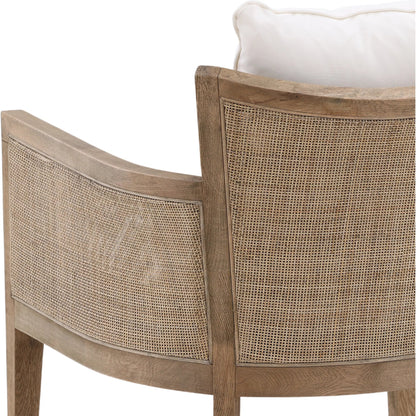 Leroy Upholstered Rattan Occasional Chair by Arch & Plane in white, natural, brown and natural rattan with off-white upholstery finish. Made from oak wood, rattan, cotton blend upholstery in a cottage & farmhouse style.