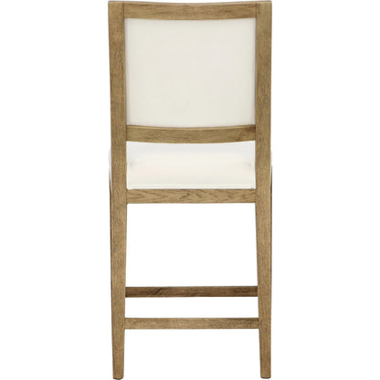 Corey Counter Stool by Arch & Plane in natural warm wash frame, white upholstery. Made from solid oak wood frame, cotton blend upholstery in a transitional style.