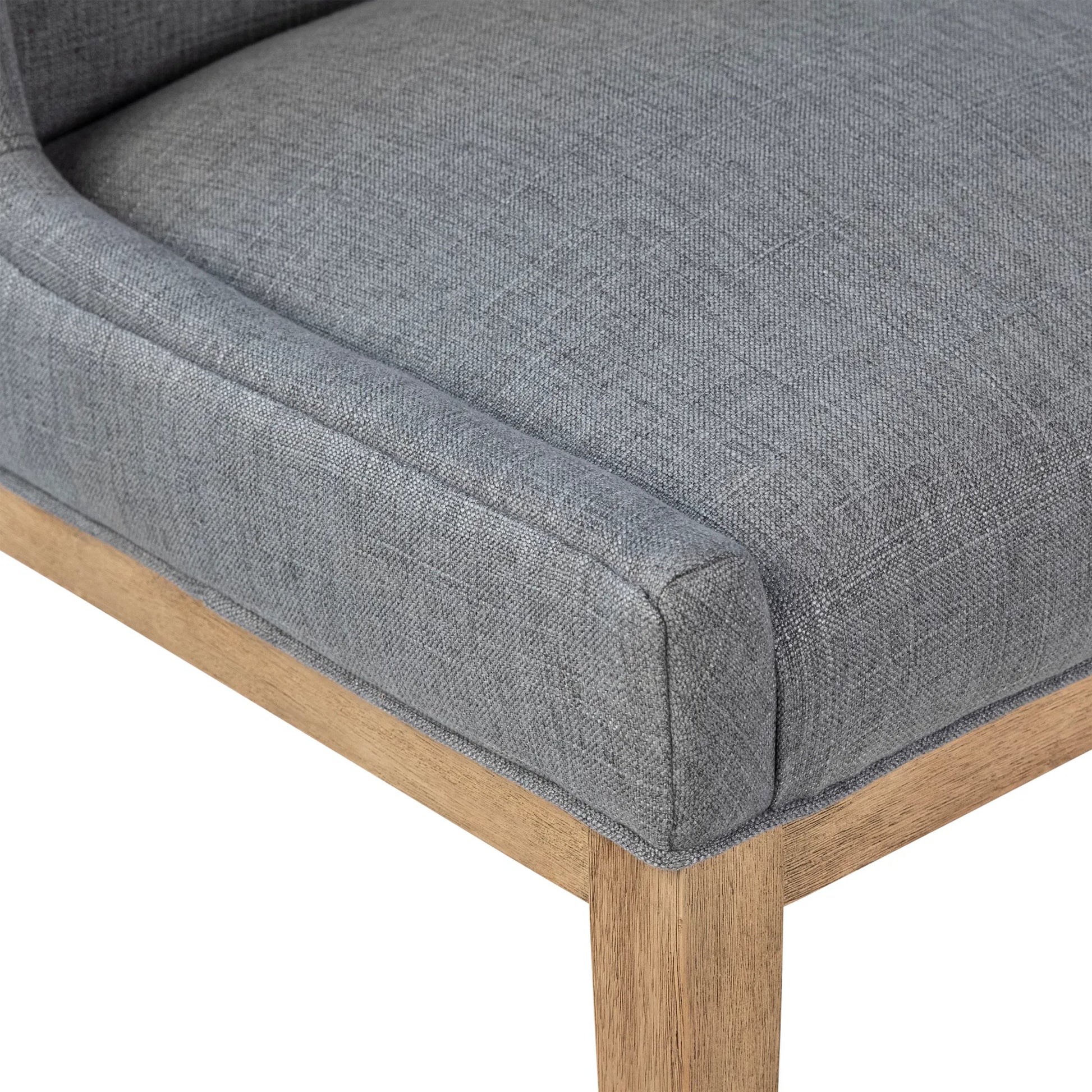 Eva Dining Chair by Arch & Plane in grey upholstery, natural wood finish. Made from cotton blend upholstery, rubberwood legs in a transitional style.