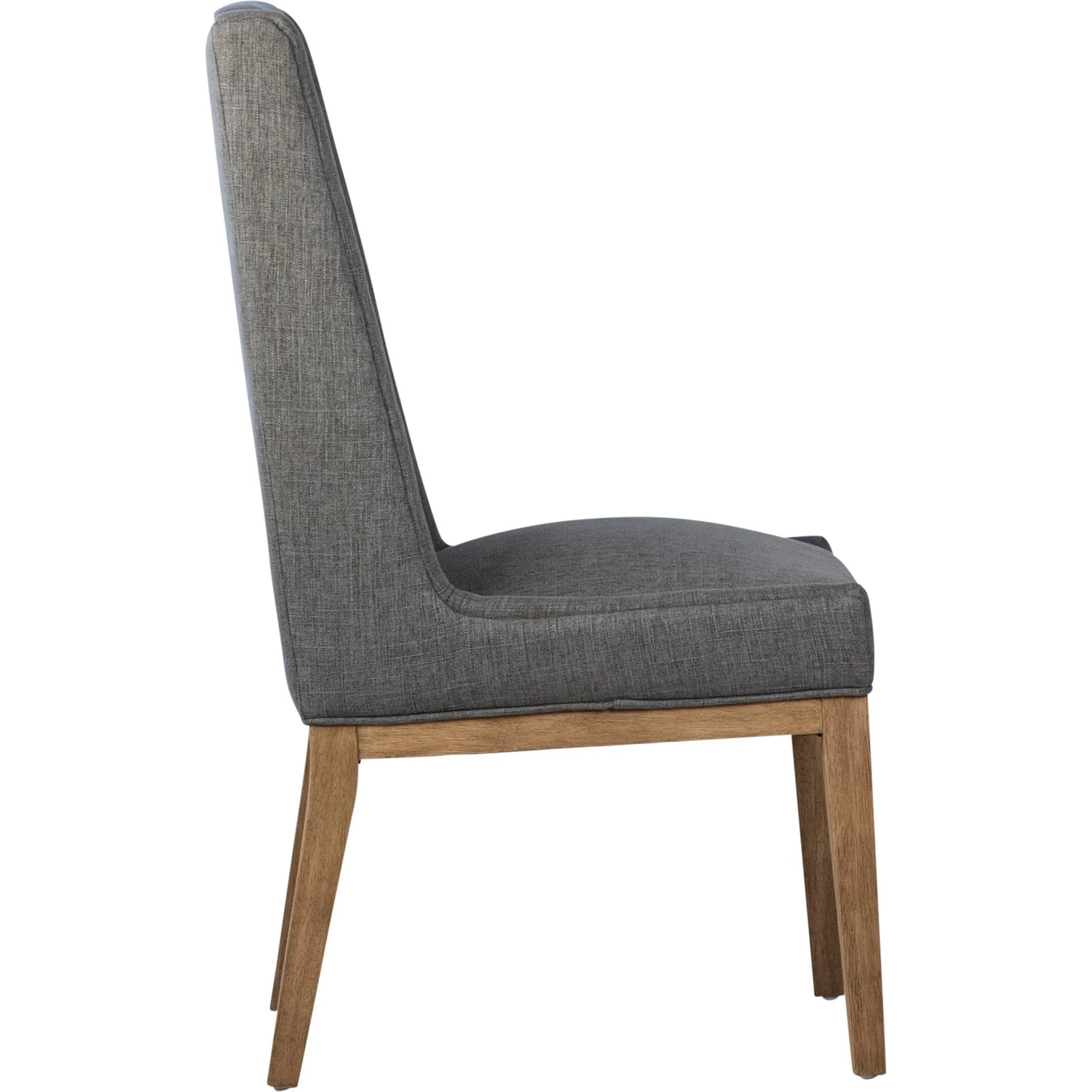 Eva Dining Chair by Arch & Plane in grey upholstery, natural wood finish. Made from cotton blend upholstery, rubberwood legs in a transitional style.