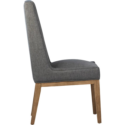 Eva Dining Chair by Arch & Plane in grey upholstery, natural wood finish. Made from cotton blend upholstery, rubberwood legs in a transitional style.