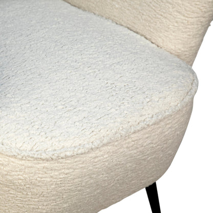 Zayne Faux Fur Occasional Chair by Arch & Plane in white, black and natural white faux fur, matte black finish. Made from faux sheepskin upholstery, solid hardwood in a modern style.