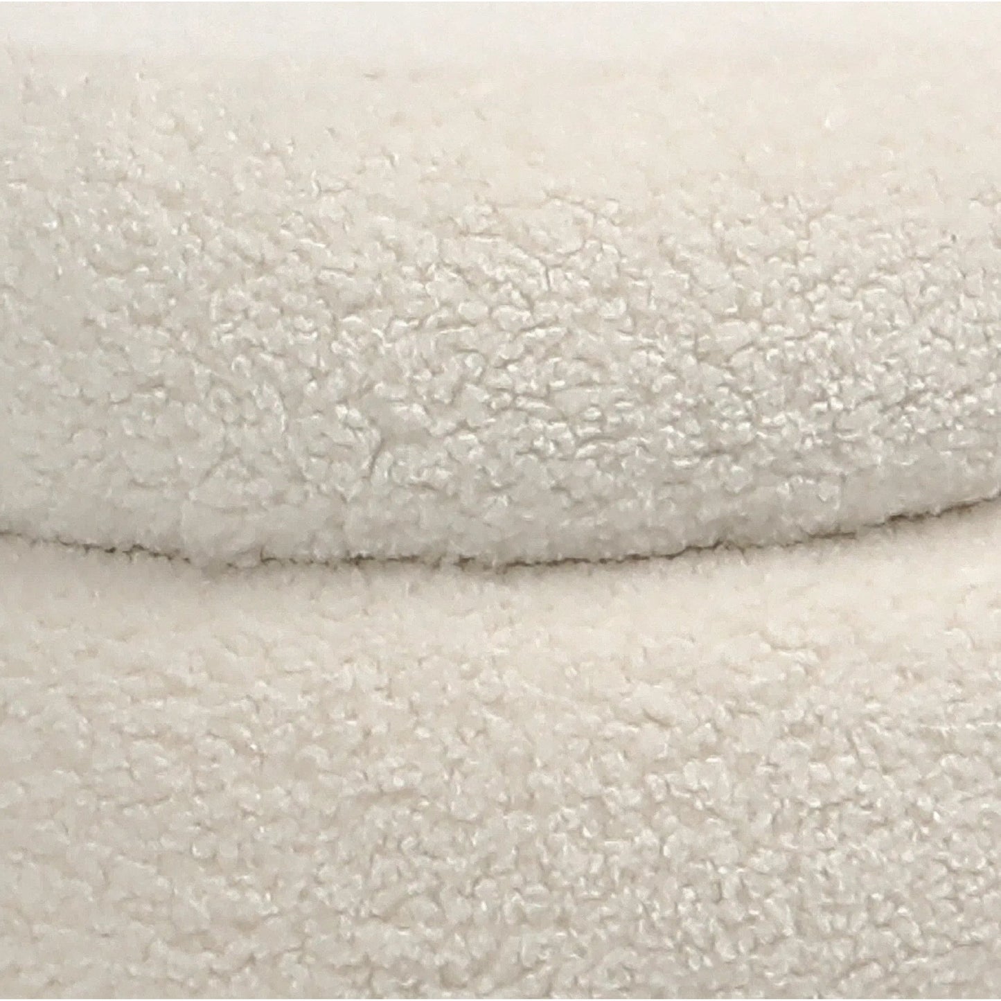 002 SI-1924484 | Closeup | Terri Ivory Faux Sheepskin Ottoman by Arch & Plane in ivory and upholstered. Made from faux sheepskin in a modern style.