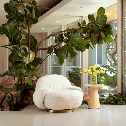 Kass Swivel Chair by Arch & Plane in ivory boucle upholstery, brushed brass base. Made from polyester upholstery, metal base in a unique style.