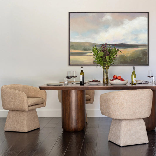 Jonie Swivel Chair by Arch & Plane in camel. Made from basketweave fabric in a unique style.