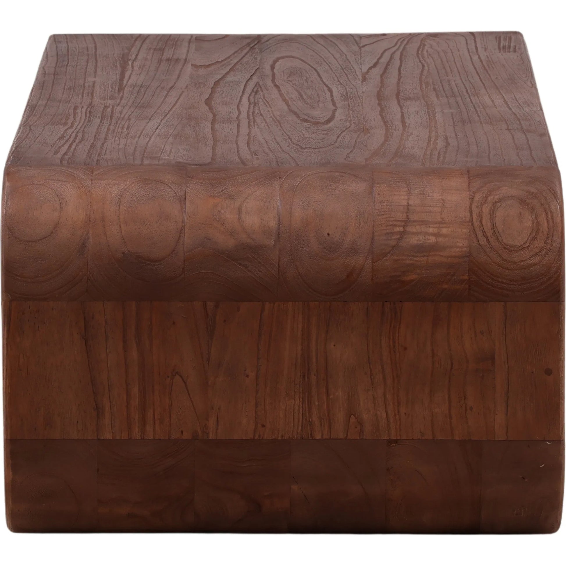 Carlos Coffee Table by Arch & Plane in medium brown. Made from mindi wood in a unique style.
