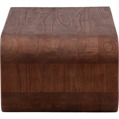 Carlos Coffee Table by Arch & Plane in medium brown. Made from mindi wood in a unique style.
