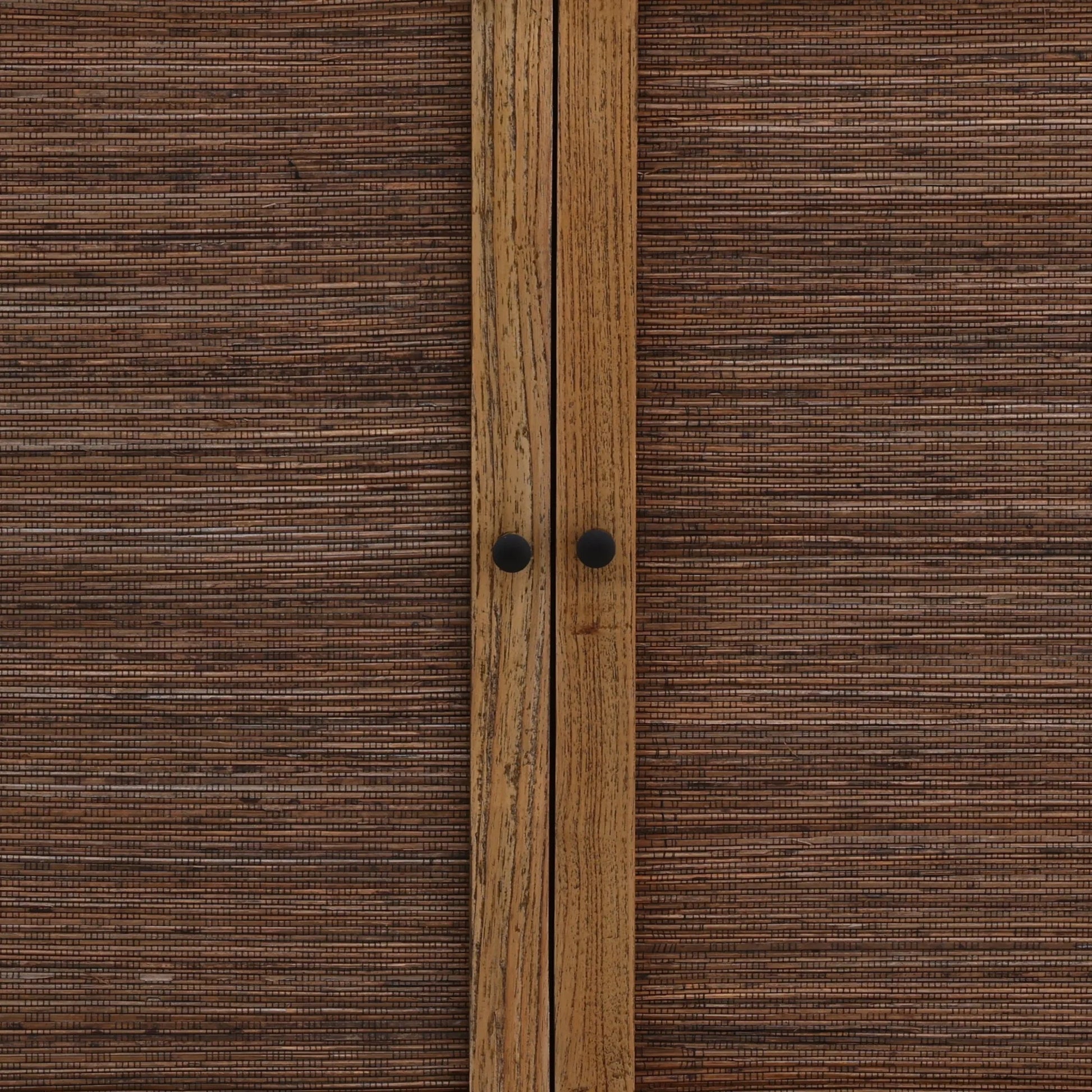 Allison Sideboard by Arch & Plane in brown. Made from mindi wood, coconut leaf rattan in a unique style.