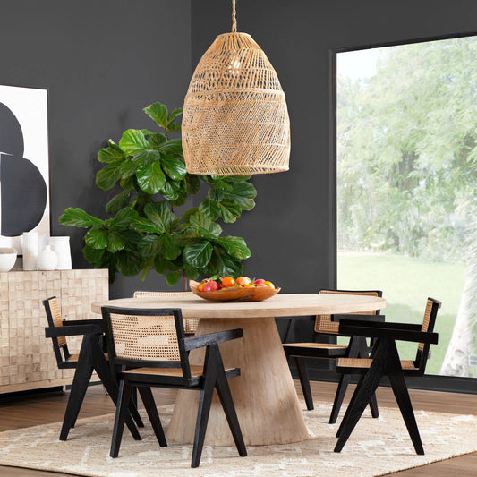 Clint Reclaimed Pine Round Pedestal Dining Table by Arch & Plane in light brown. Made from reclaimed pine in a modern style.