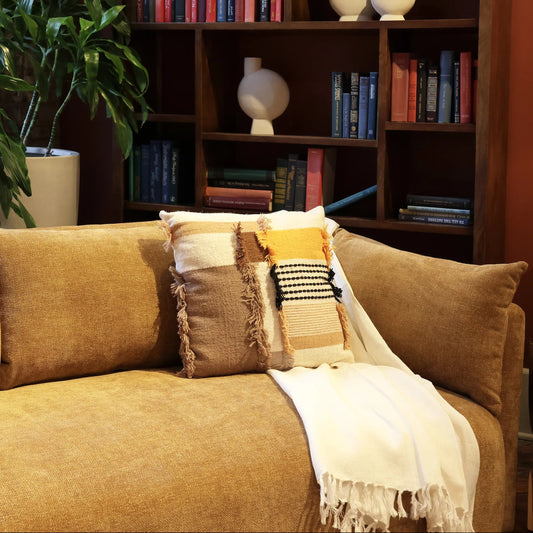 Gwendoyln Throw by Arch & Plane in cream. Made from 100% linen in a unique style.