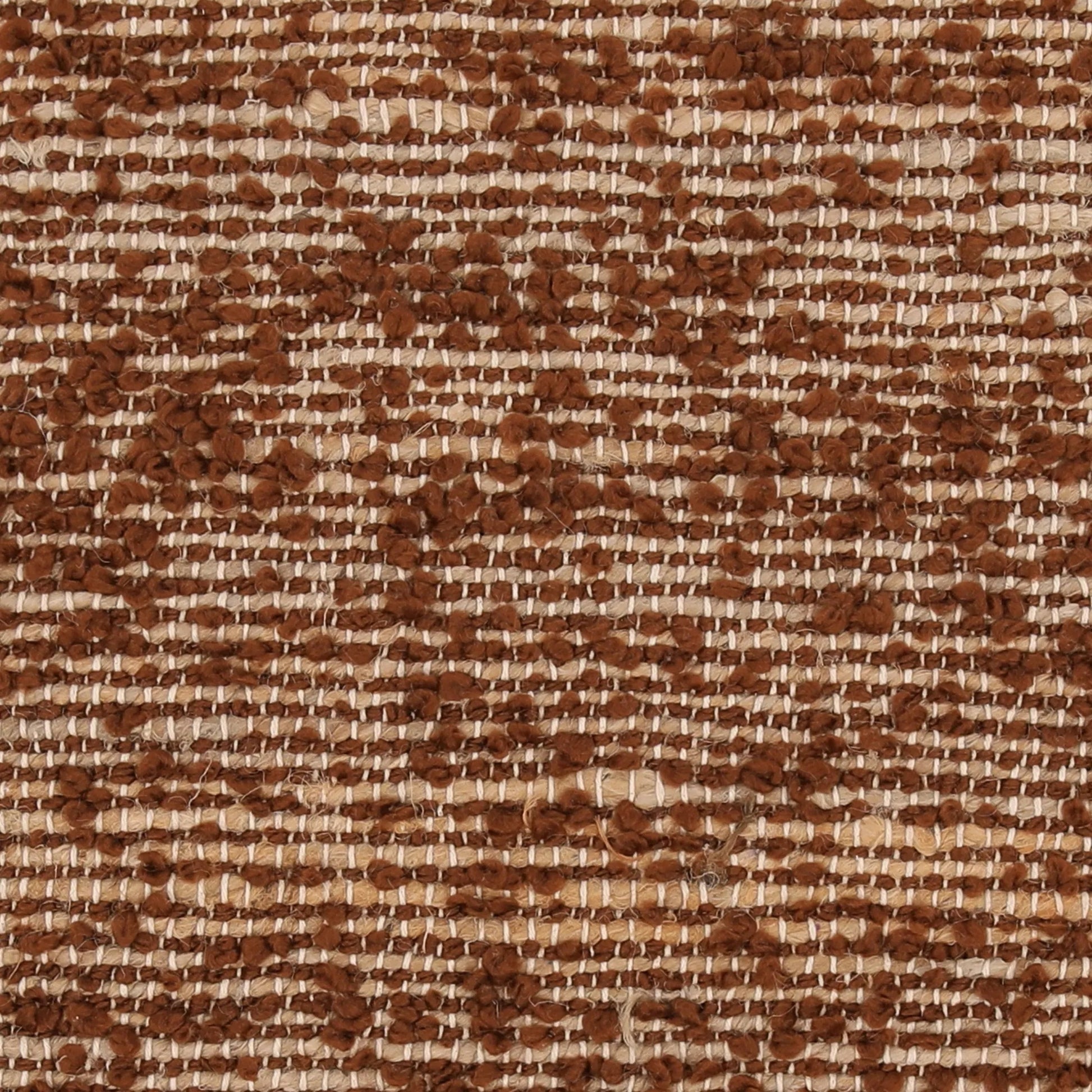 Teri Pillow by Arch & Plane in brown. Made from handwoven jute, cotton blend cover in a unique style.