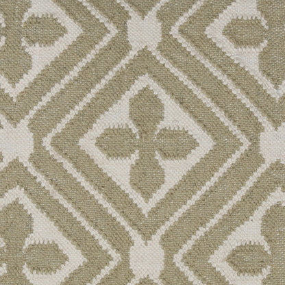 Dillan Outdoor Pillow by Arch & Plane in sage. Made from handwoven punja kilim pet yarn in a unique style.