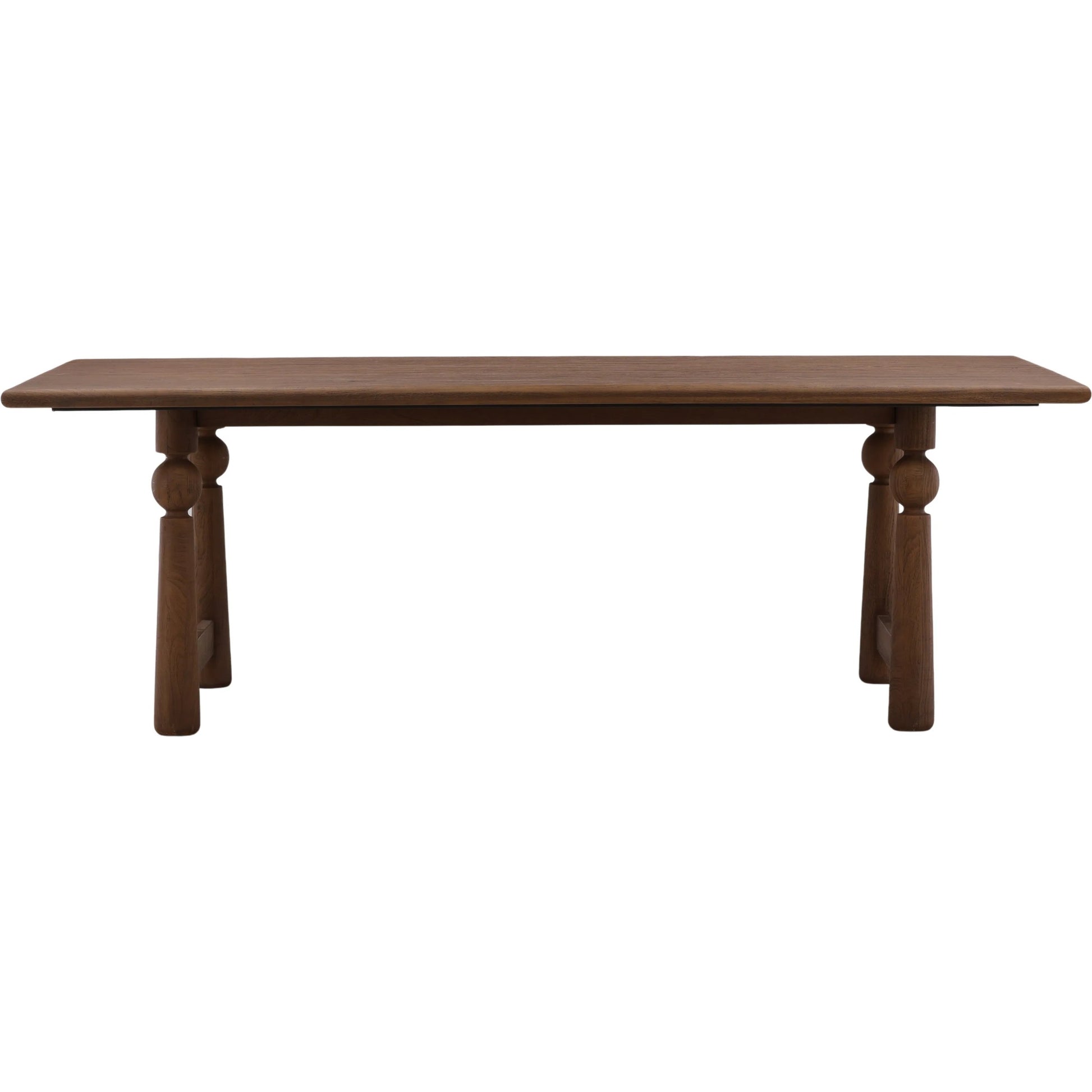 Wheeler Dining Table by Arch & Plane in brown. Made from mango wood in a unique style.