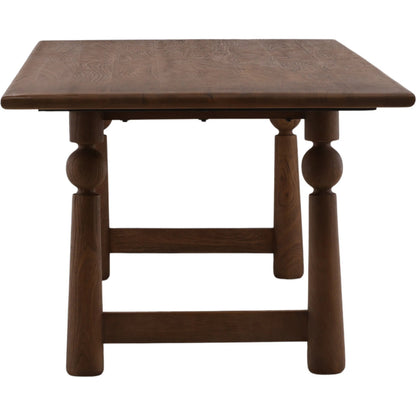 Wheeler Dining Table by Arch & Plane in brown. Made from mango wood in a unique style.