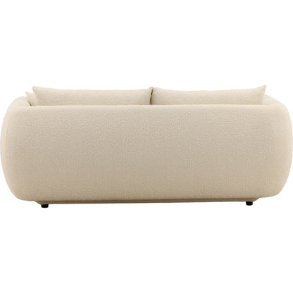 Deann Sofa by Arch & Plane. Made from boucle fabric in a unique style.